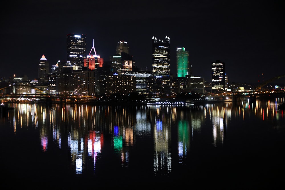 a view of a city at night from across the water