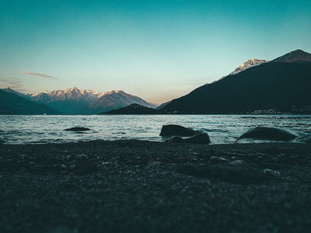 a view of a lake with mountains in the background