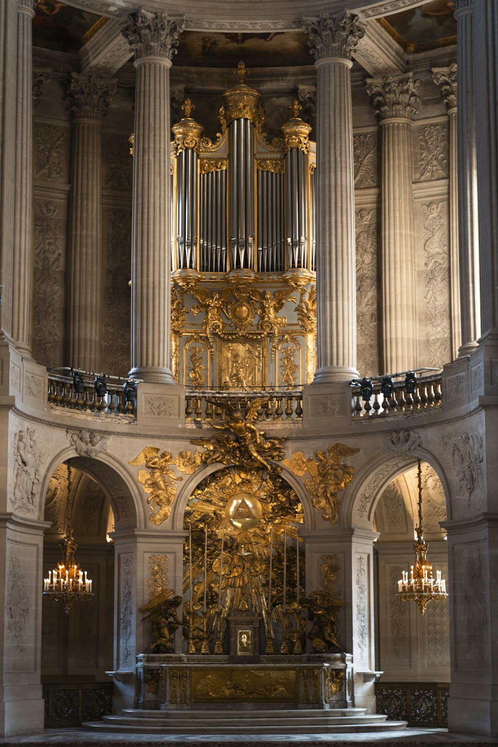 a church with a large organ in the middle of it