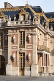 a large building with a clock on the front of it