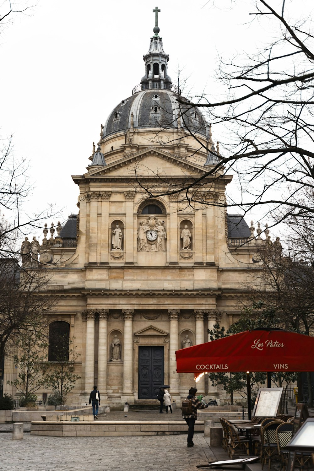 a large building with a clock on the top of it