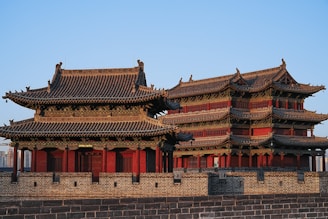 a tall building with a lot of windows on top of it