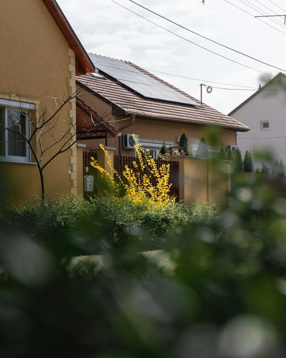 a house with a solar panel on the roof