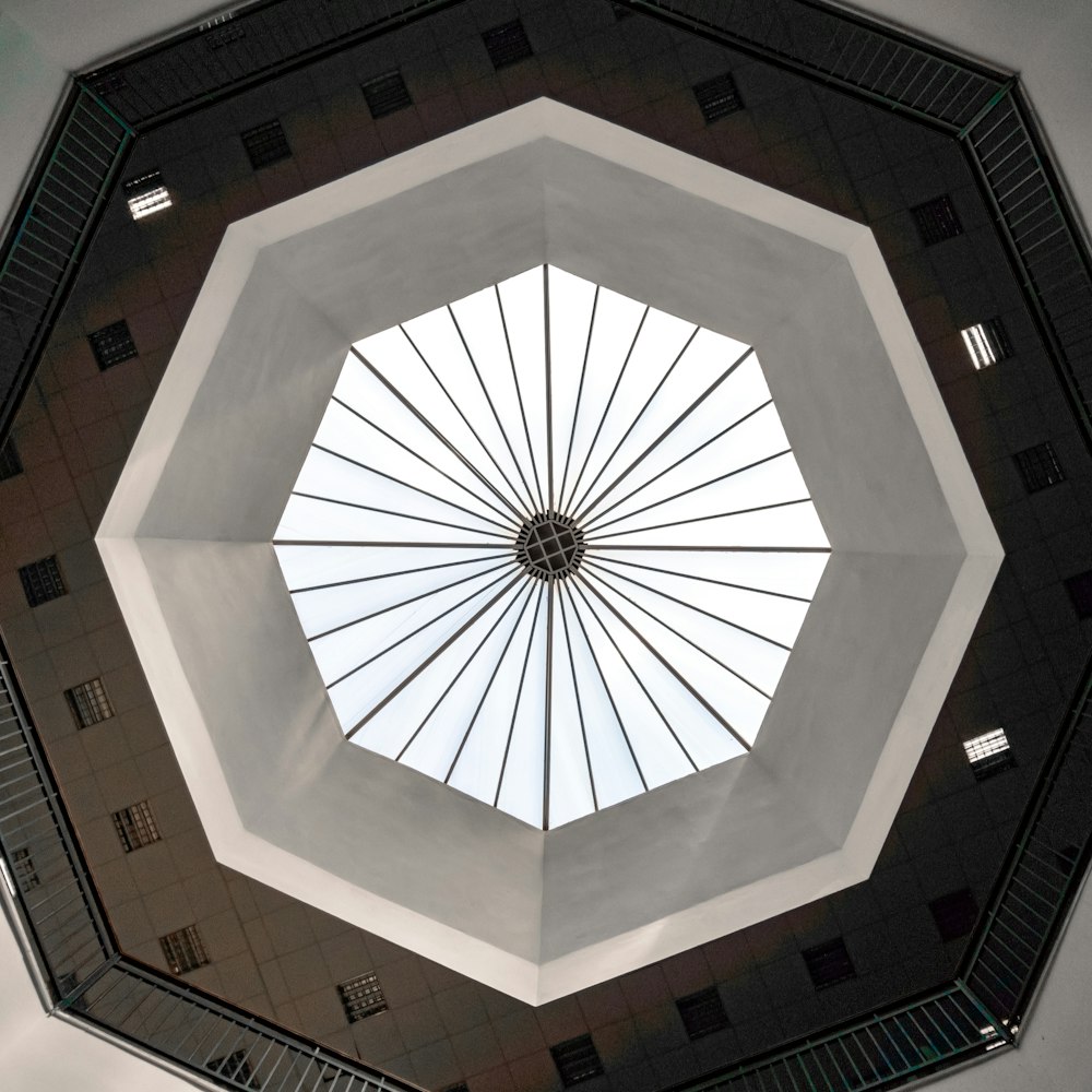 a view of the ceiling of a building from below