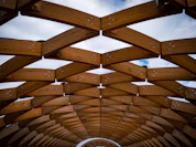 a wooden structure with a sky background