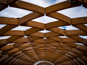 a wooden structure with a sky background