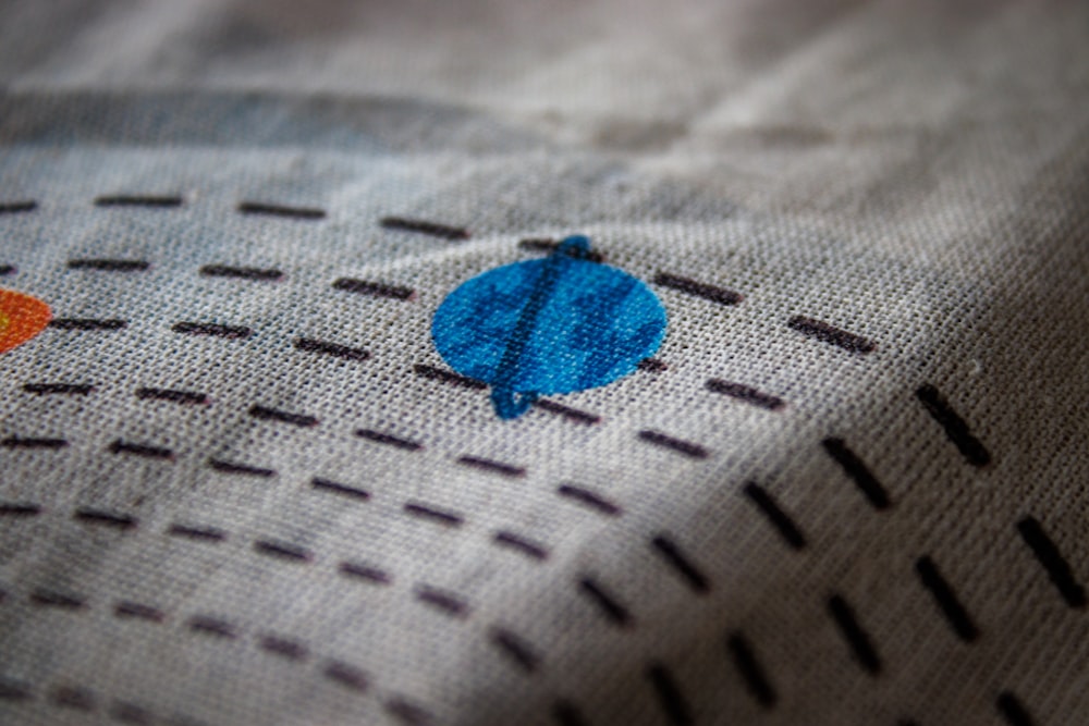 a close up of a piece of cloth with a design on it