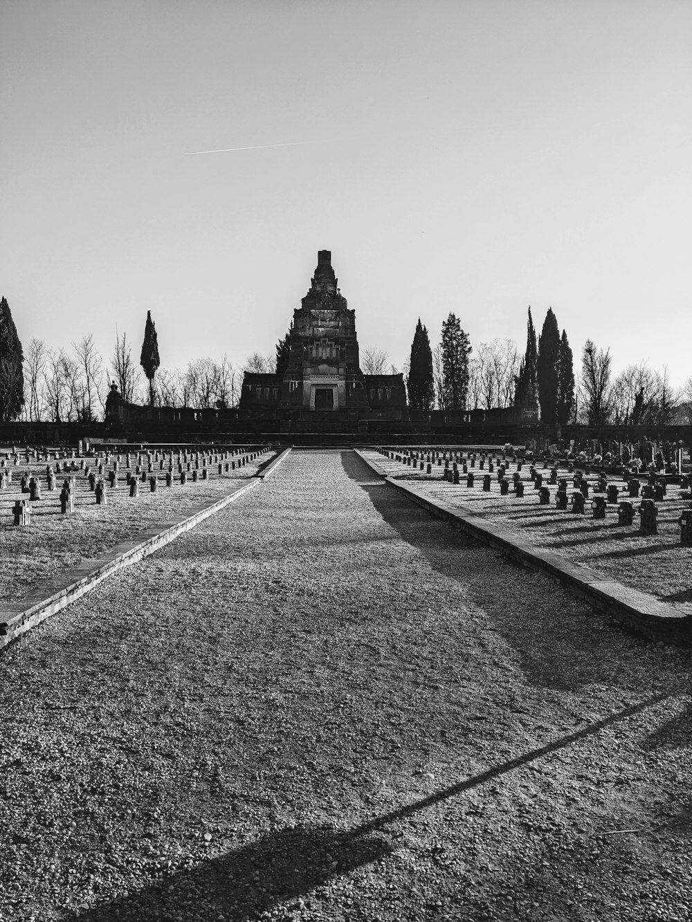 a black and white photo of a cemetery