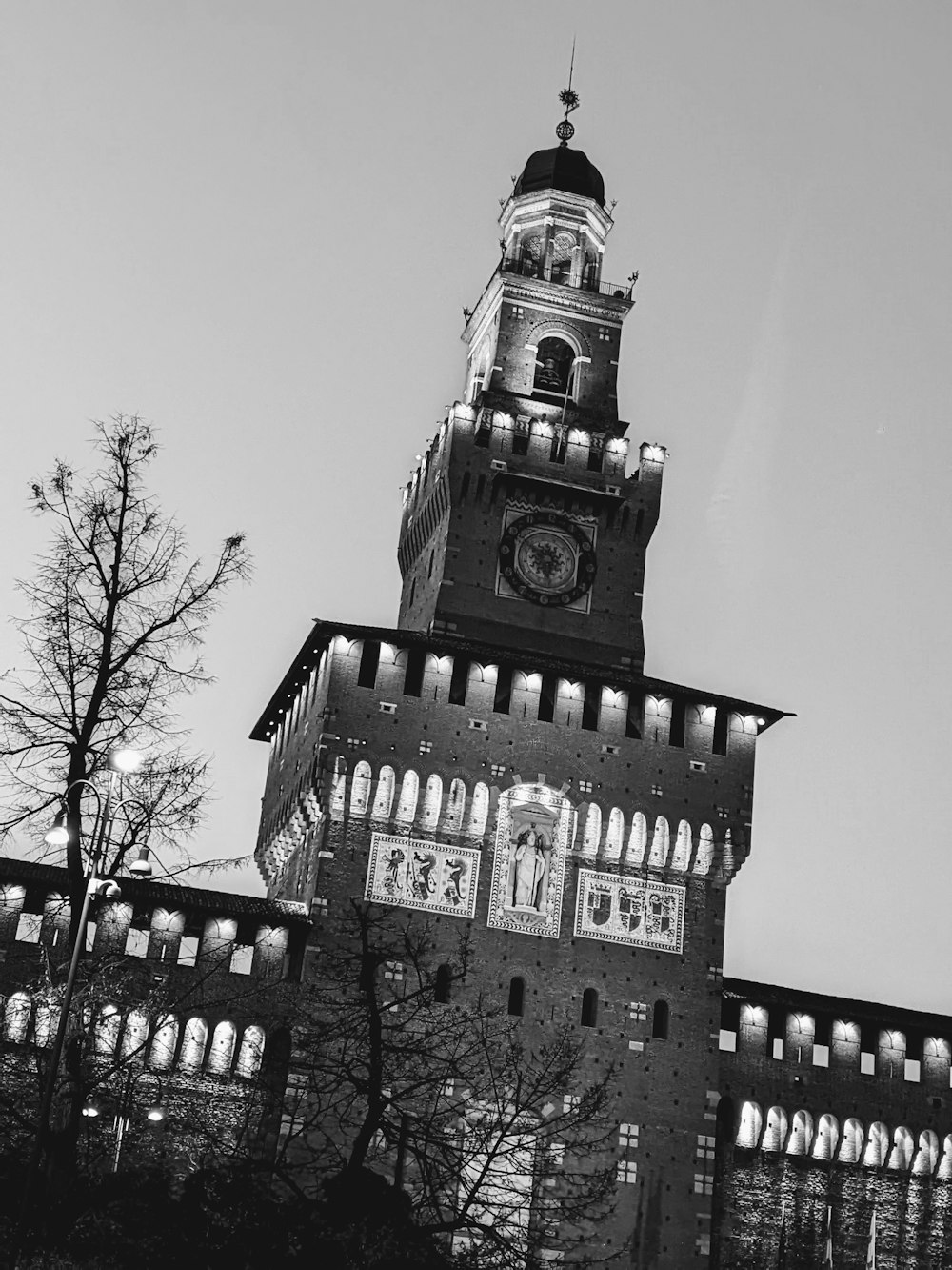 a tall building with a clock on it's side