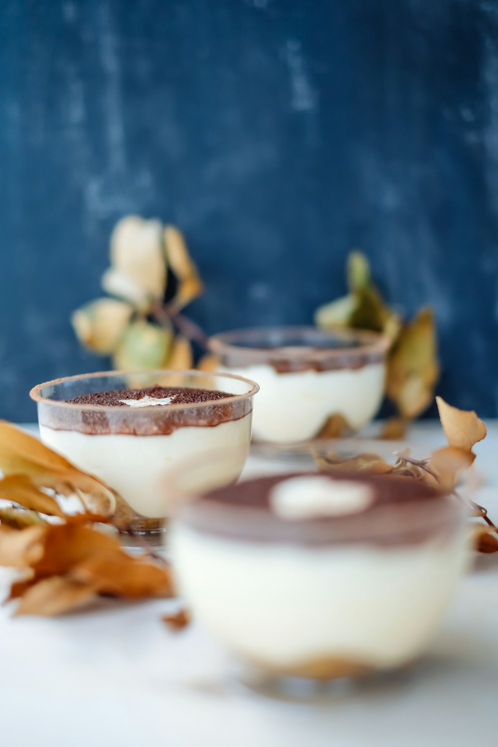 a couple of desserts sitting on top of a table