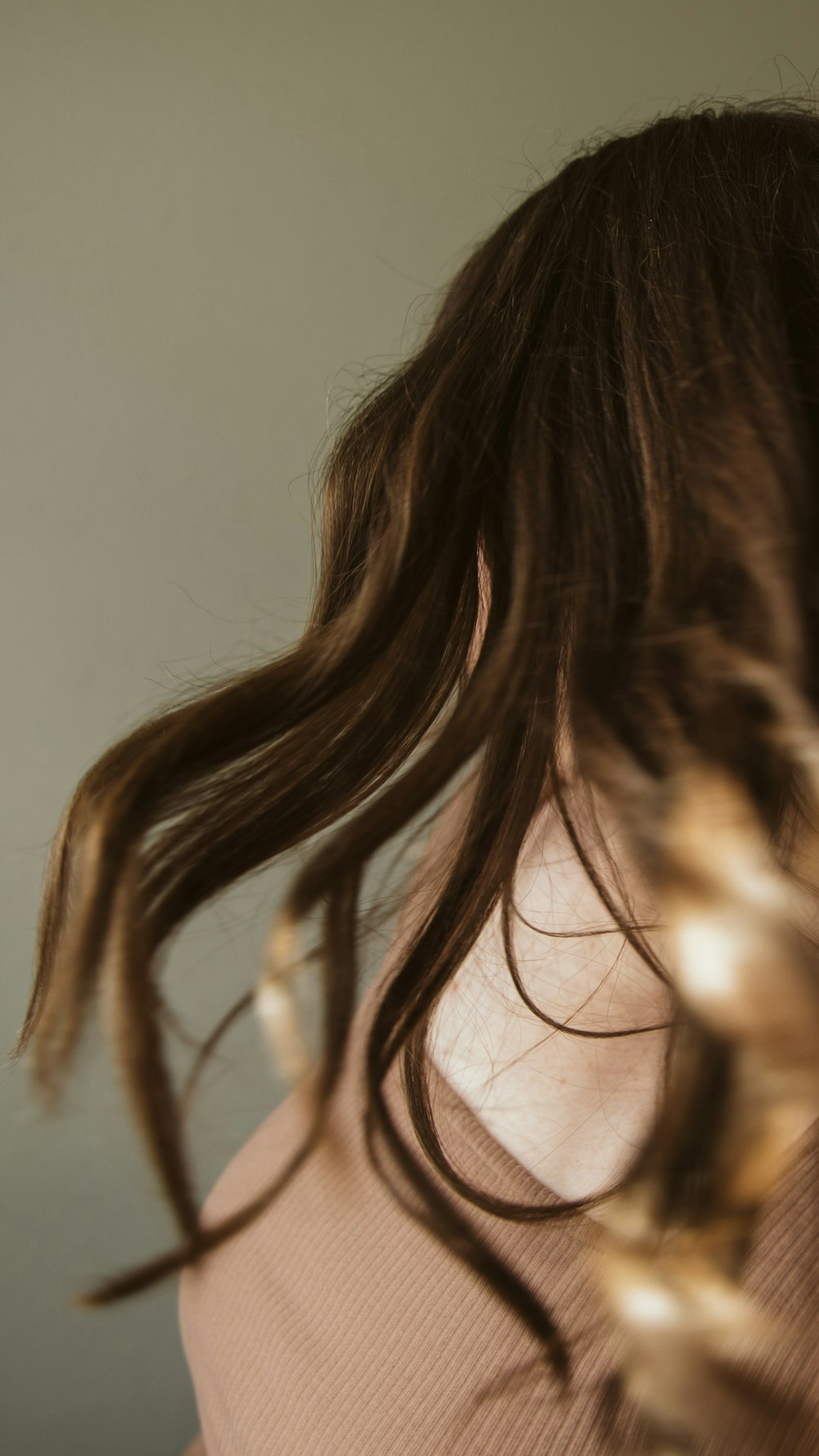 the back of a woman's head with long hair