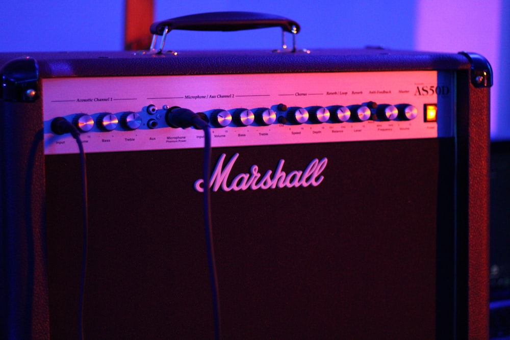 a close up of a guitar amp in a room