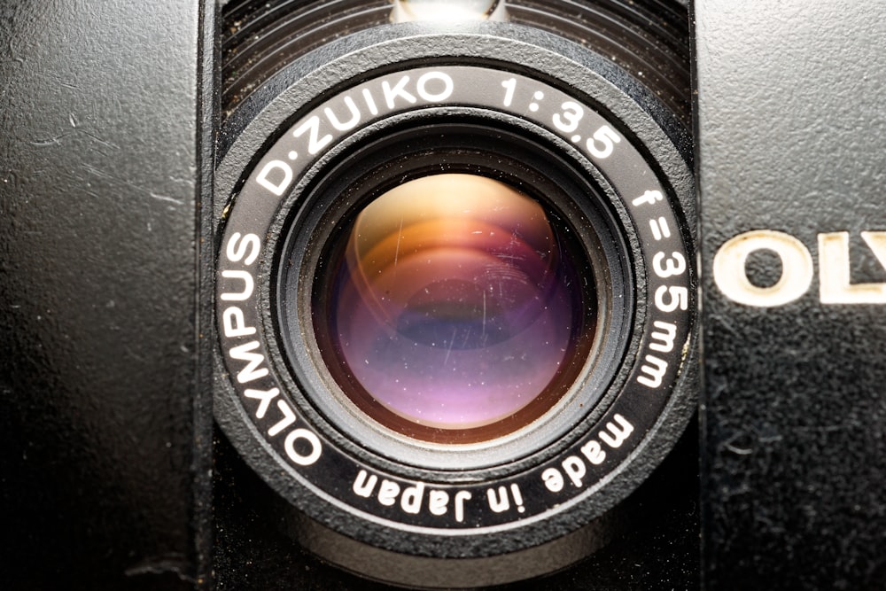 a close up of a camera with a lens