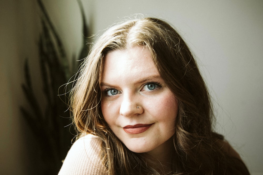 a close up of a person with long hair