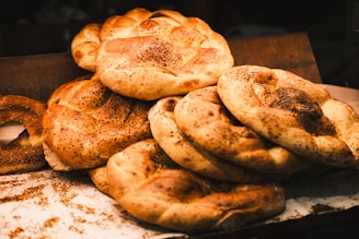 a bunch of breads that are on a table