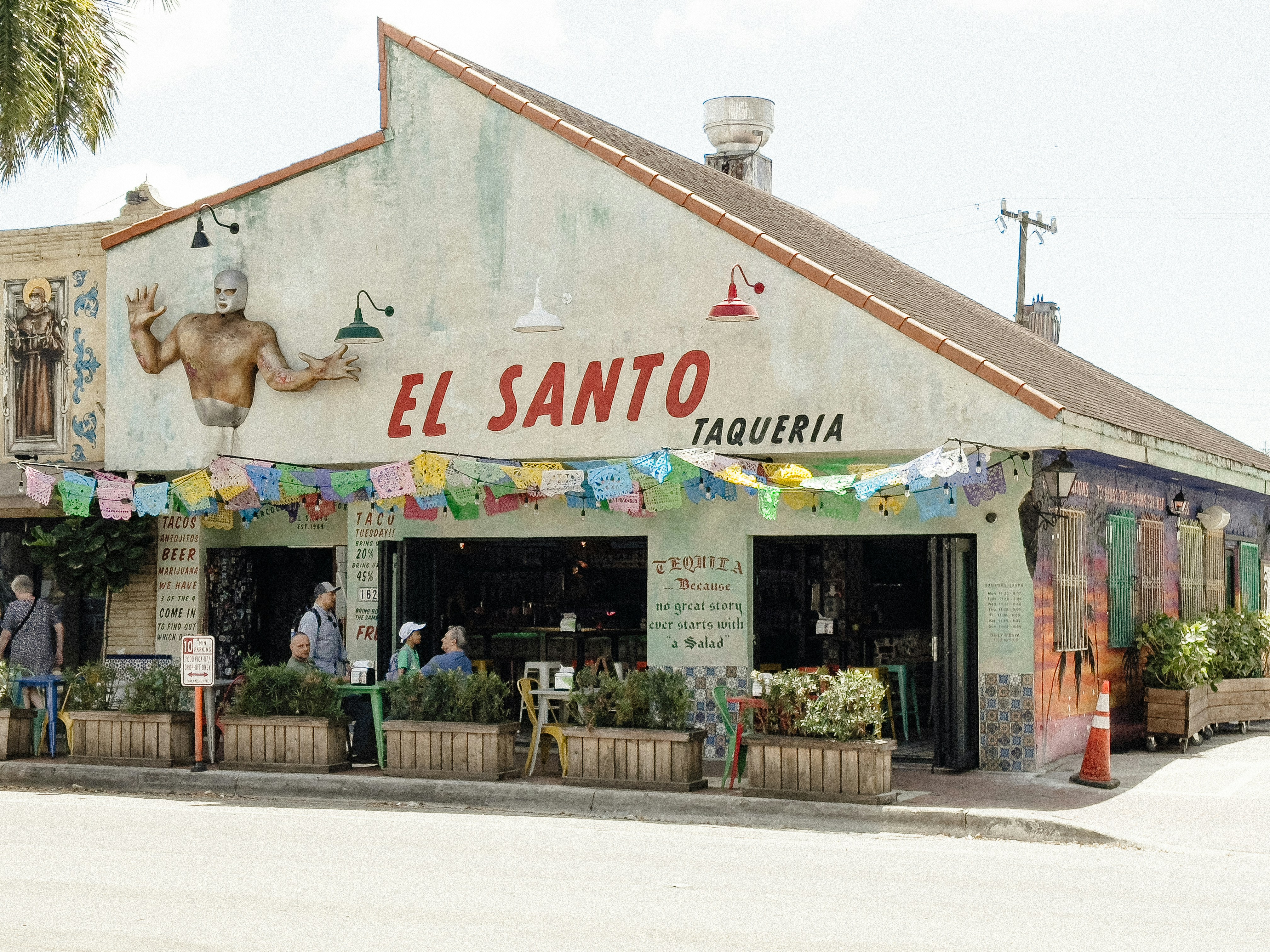 a building with a sign that says el santo taqueria