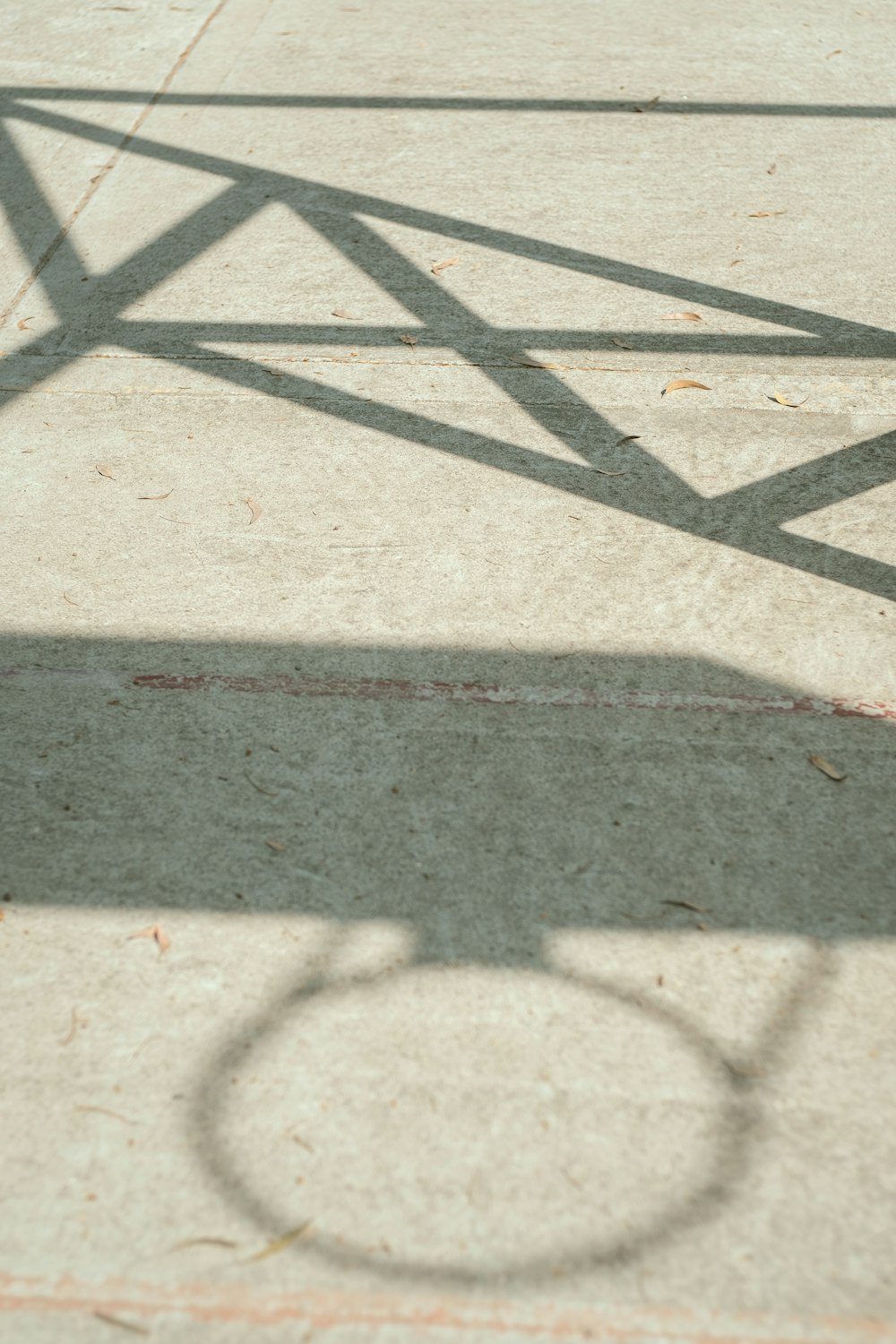 a shadow of a person riding a skateboard