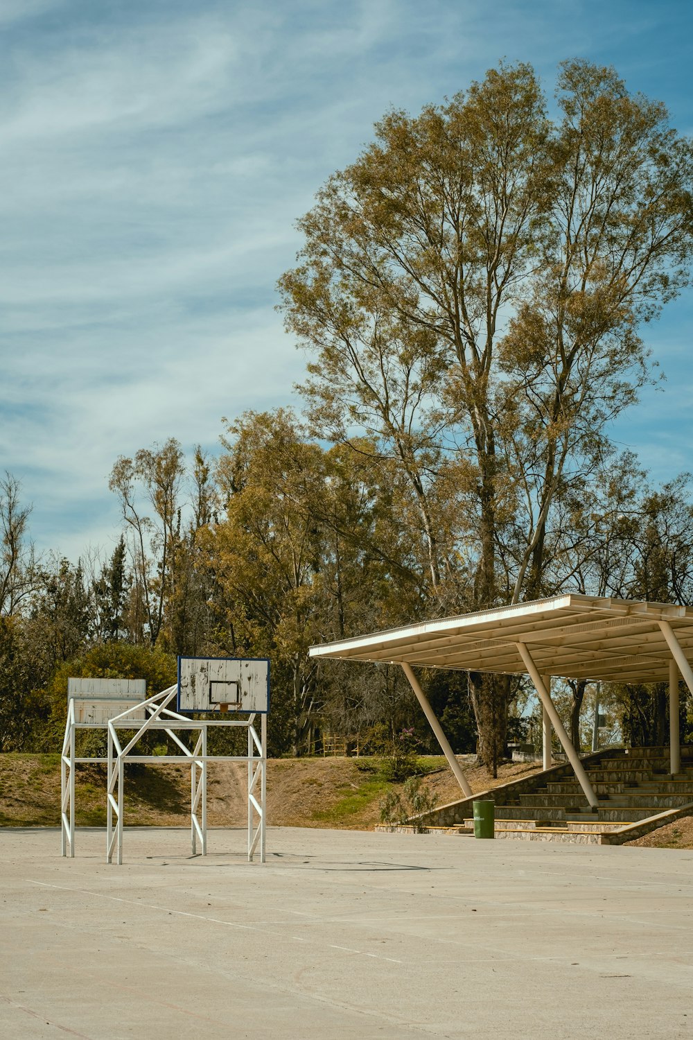 a basketball court with a basketball goal and a basketball hoop