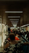 a group of people sitting in a waiting area