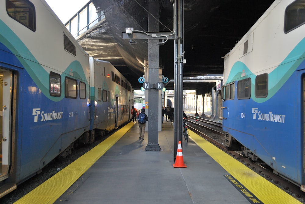 a couple of trains that are next to each other