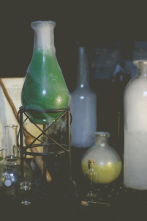 a table topped with different types of glassware