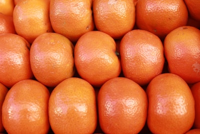 a pile of oranges sitting next to each other