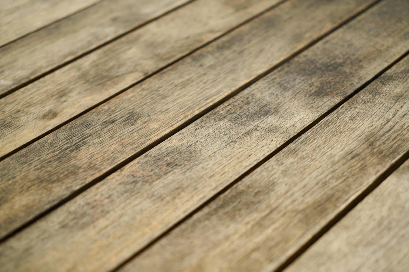 Close-up of gray, weathered wooden deck boards
