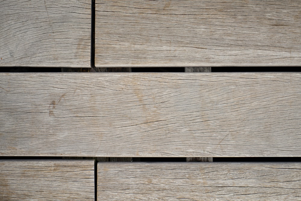 a close up view of a wooden surface