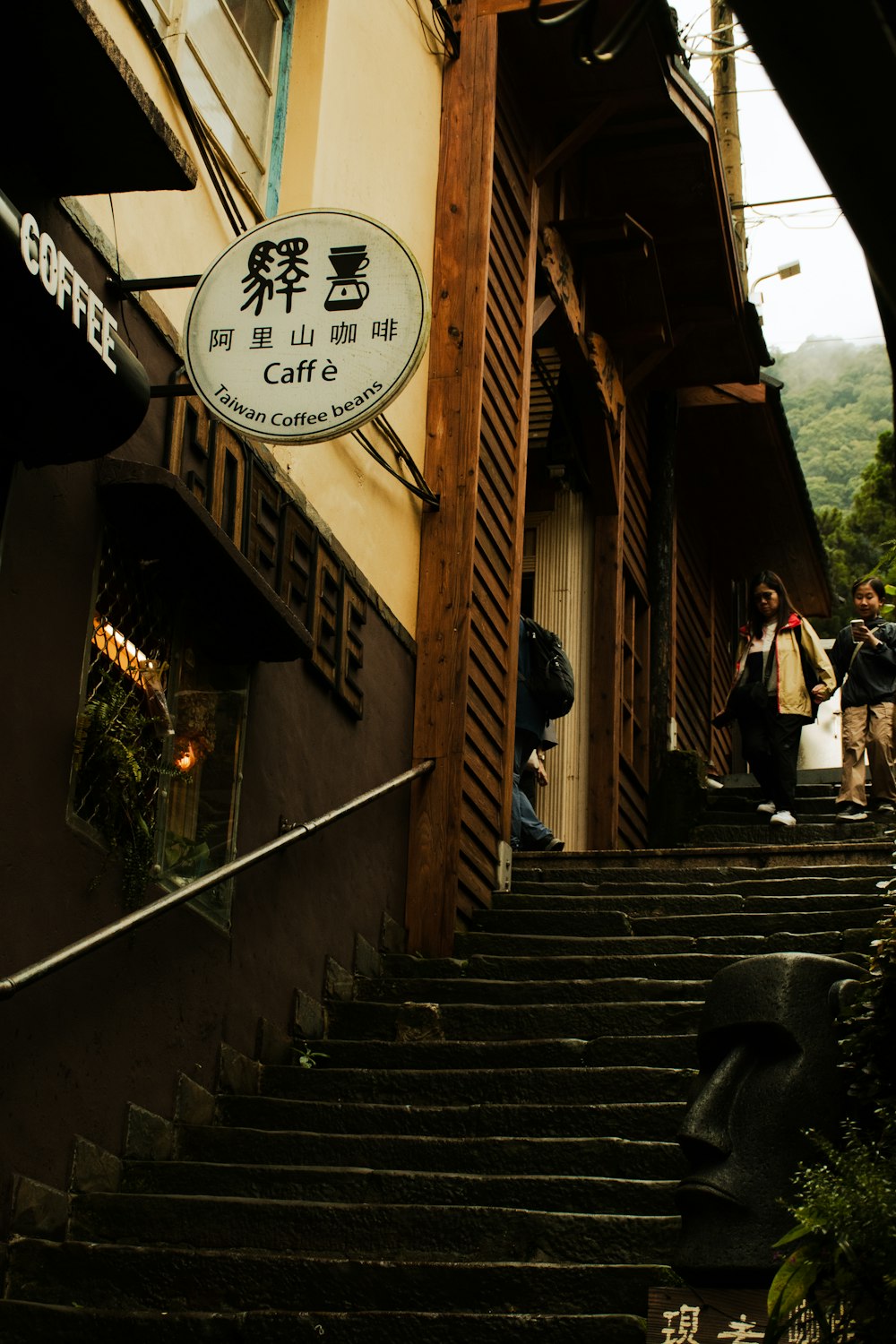 a group of people walking down a set of stairs