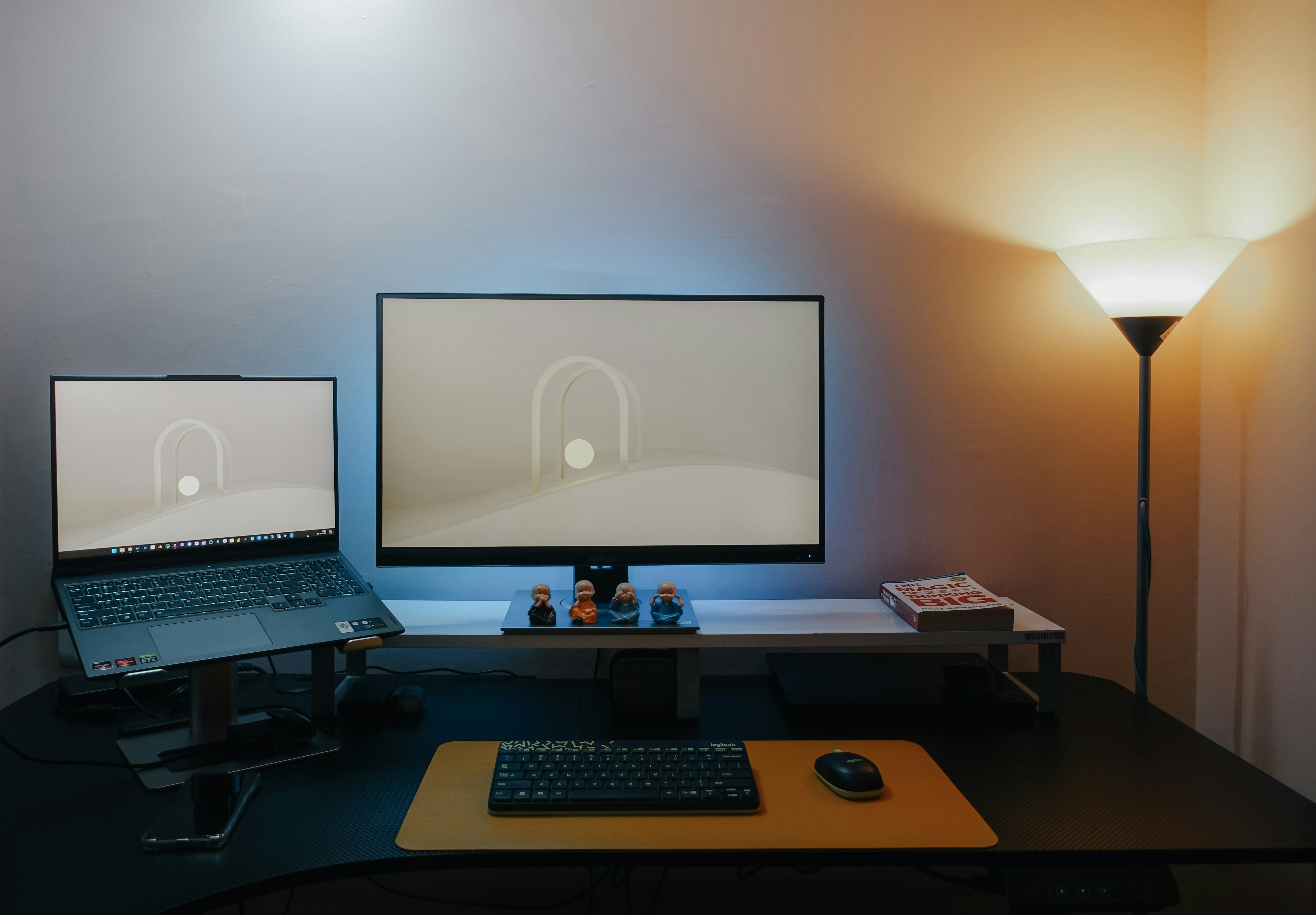 Desk setup with laptop and monitor