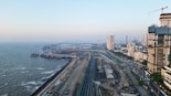 a large body of water next to a city