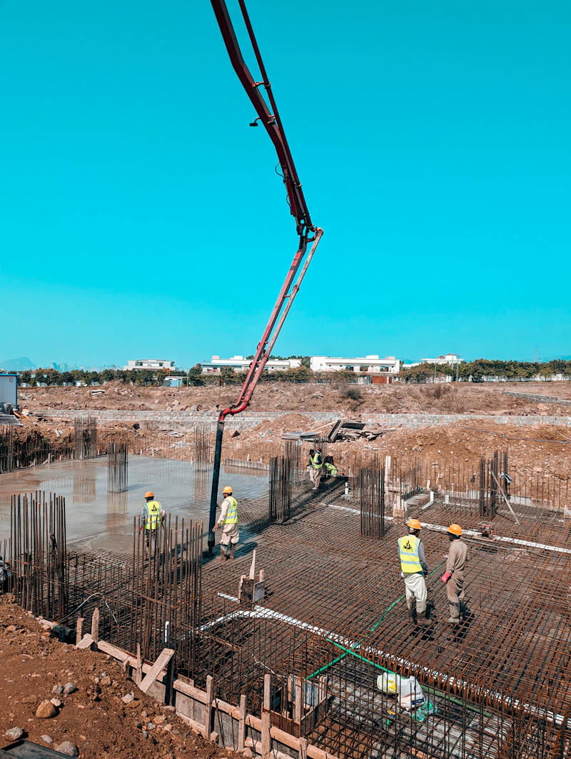 Workers on a concrete construction site