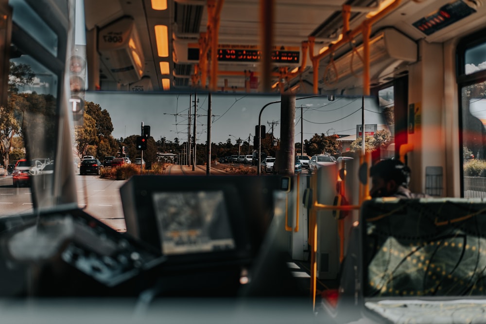 a view of a city street from inside a bus