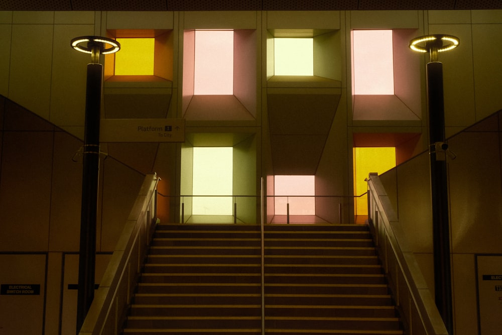 a stairwell with a set of stairs leading up to the top of it