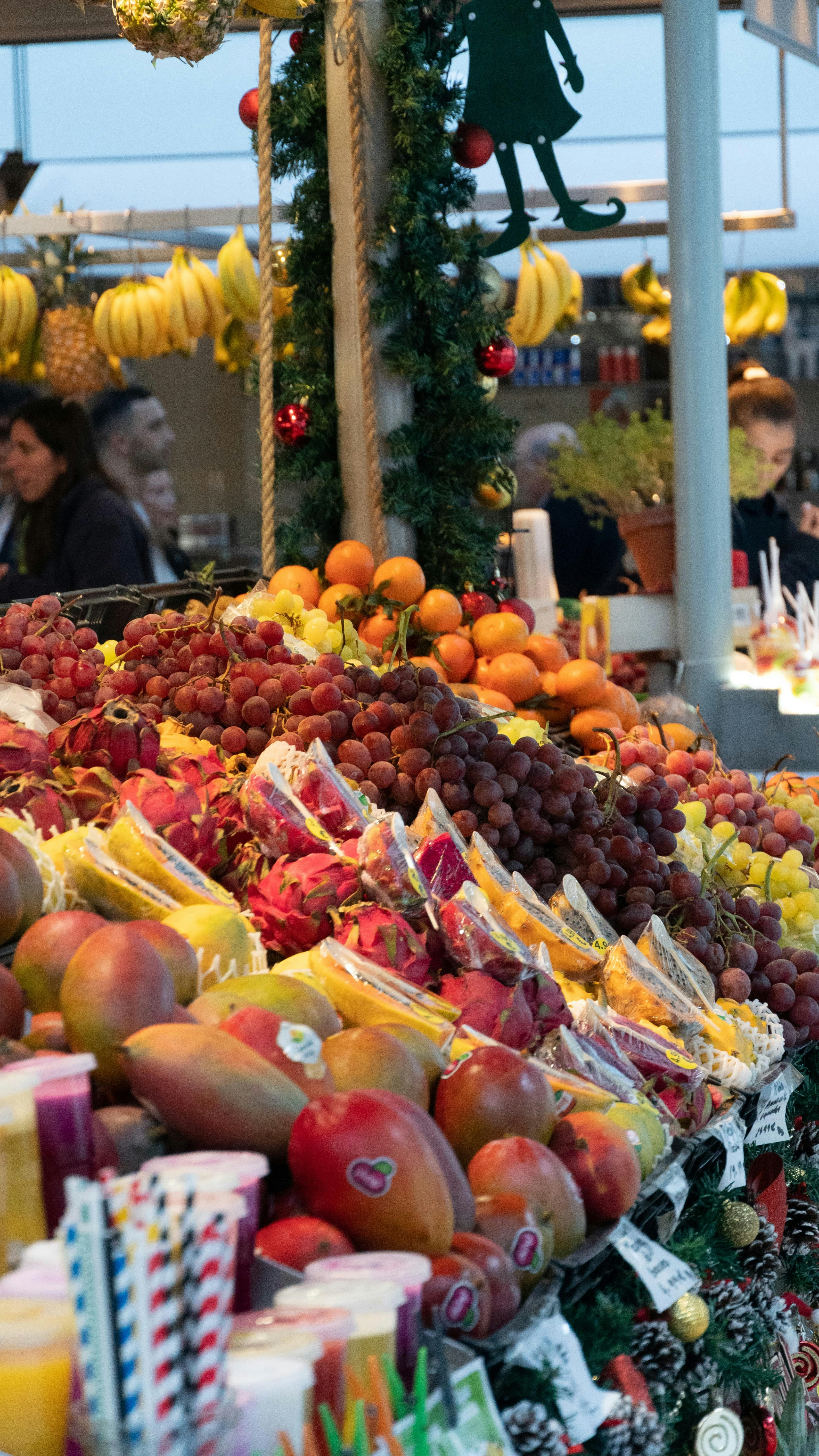 A colorful array of fruits and vegetables spread out on a surface.