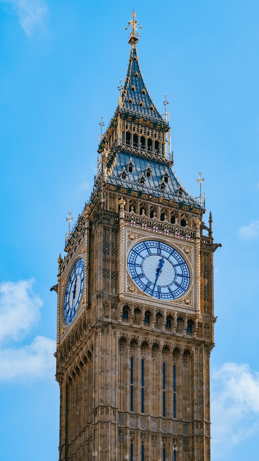 a tall clock tower with a sky background