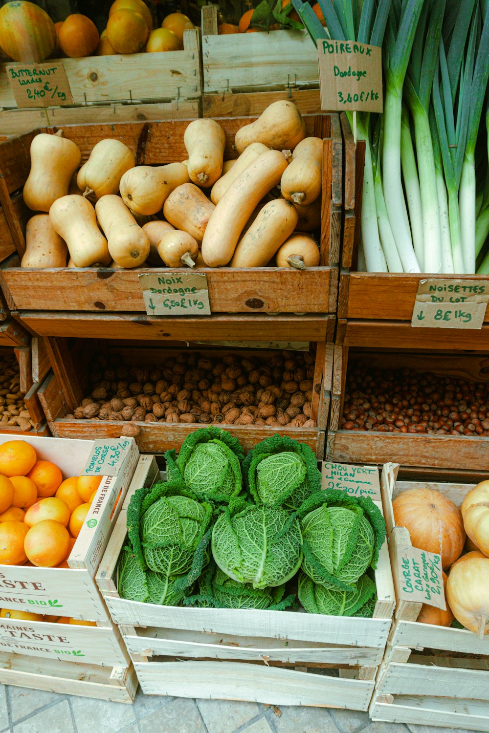 a variety of fruits and vegetables are on display