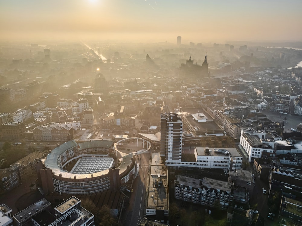 an aerial view of a city with a lot of tall buildings