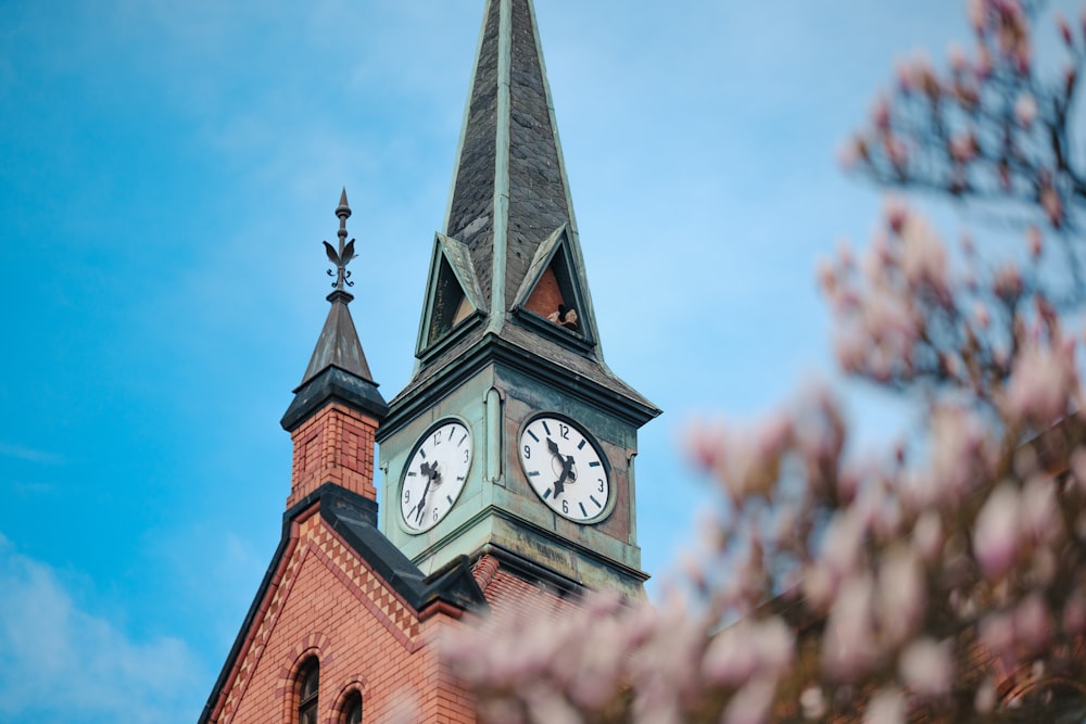 a clock tower with a sky background