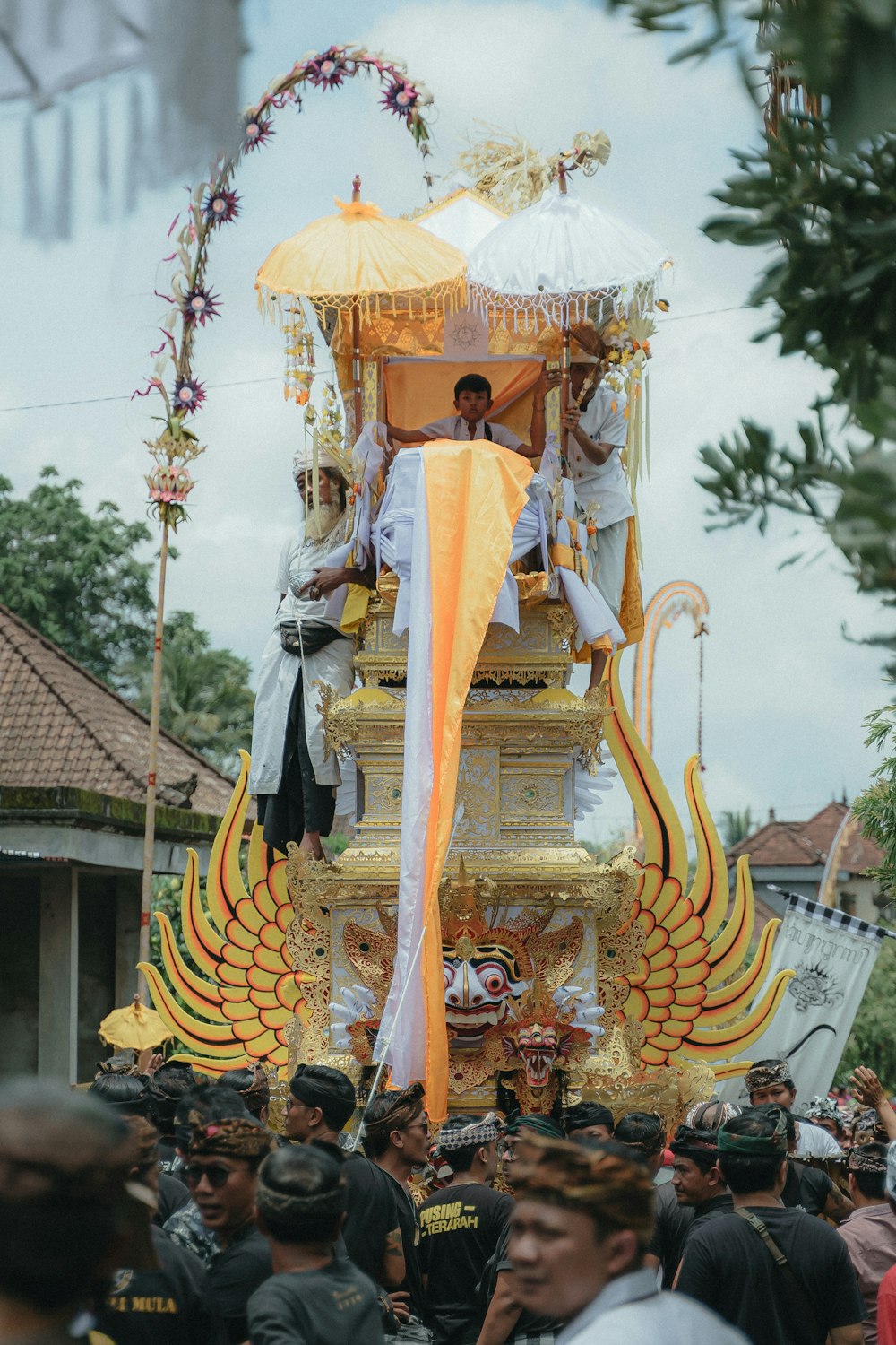 a group of people standing around a float