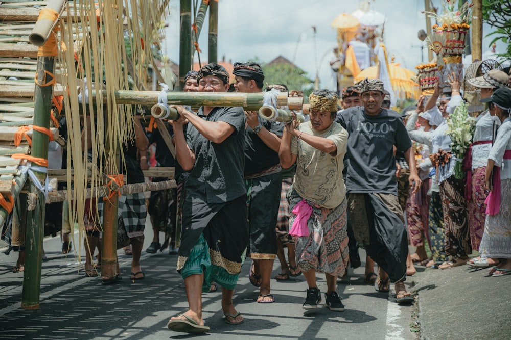 a group of people walking down a street