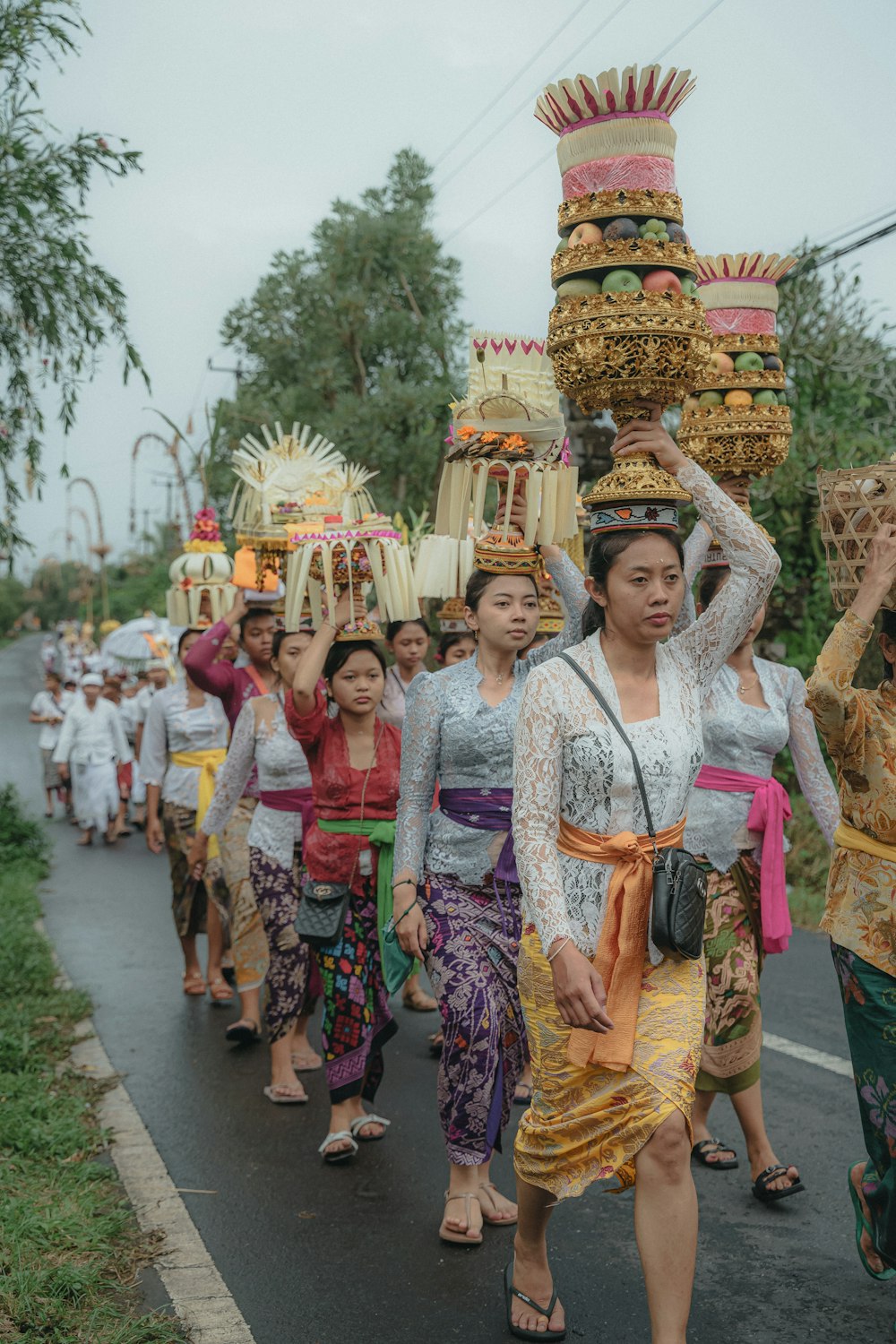 a group of people walking down a street