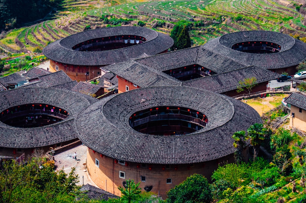 an aerial view of a building with a circular roof