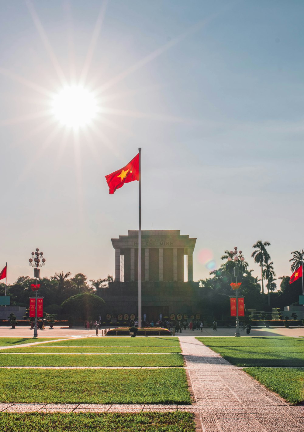 a flag flying in front of a building