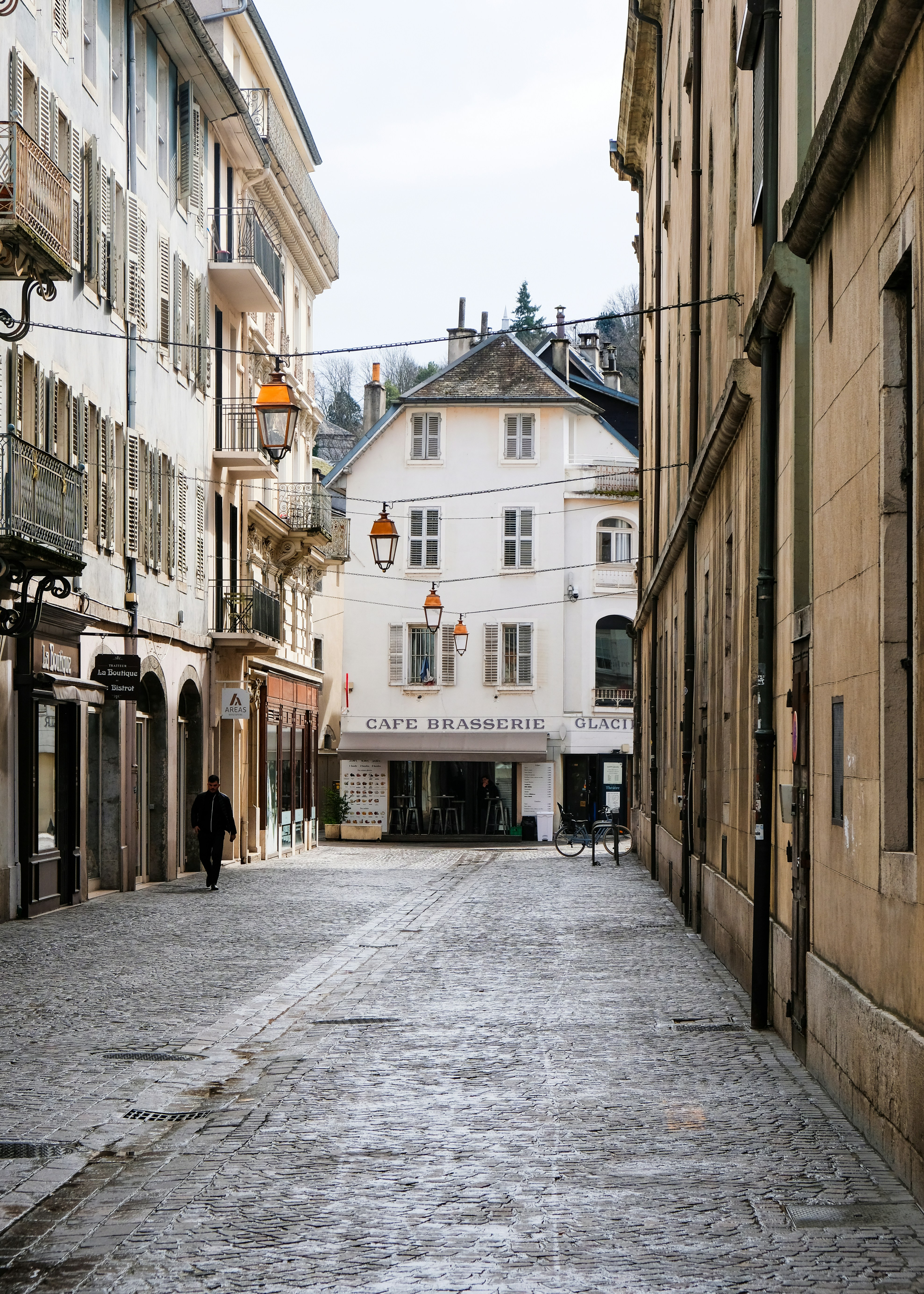 a cobblestone street in a european city