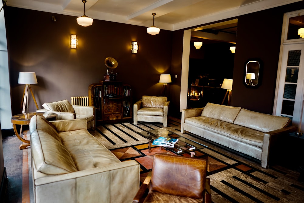 a living room filled with furniture and lamps