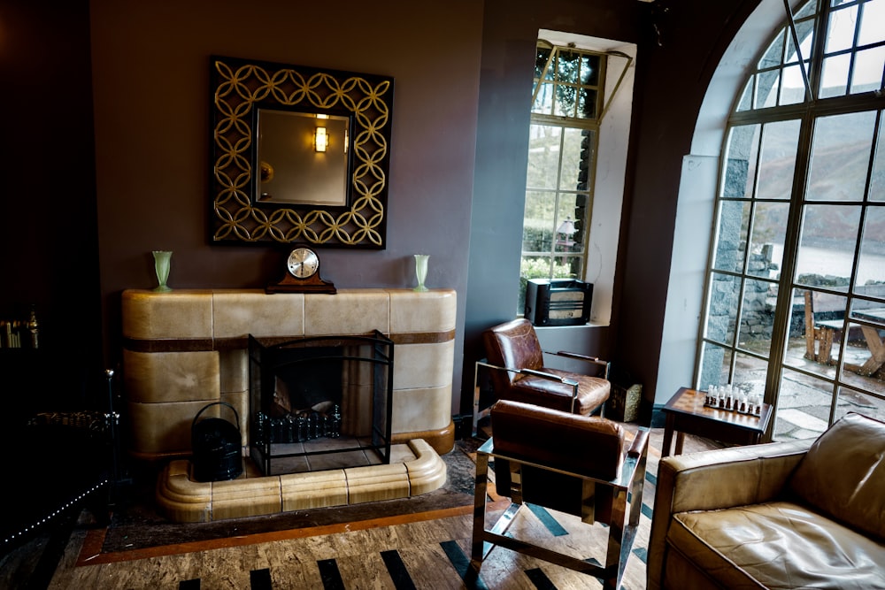 a living room filled with furniture and a fire place