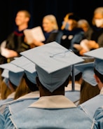 a group of people in graduation caps and gowns