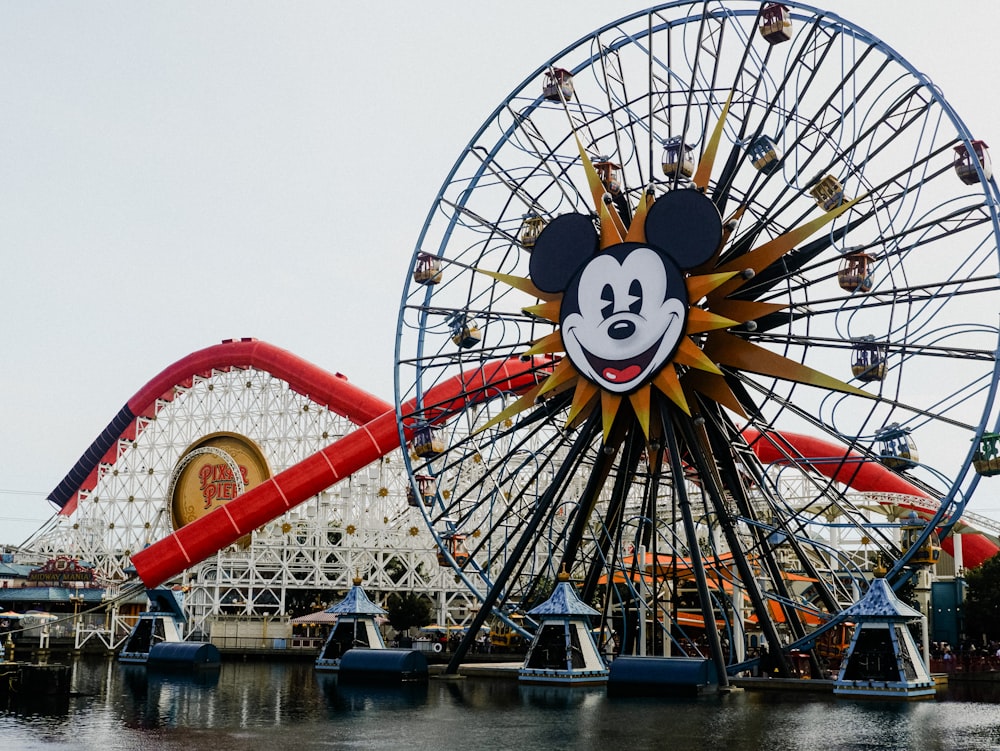 a ferris wheel with a mickey mouse face on it