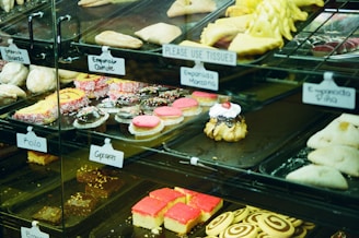 a display case filled with lots of different types of pastries